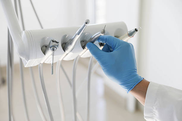 Professional Tooth Extraction technician working in Saddle River, NJ